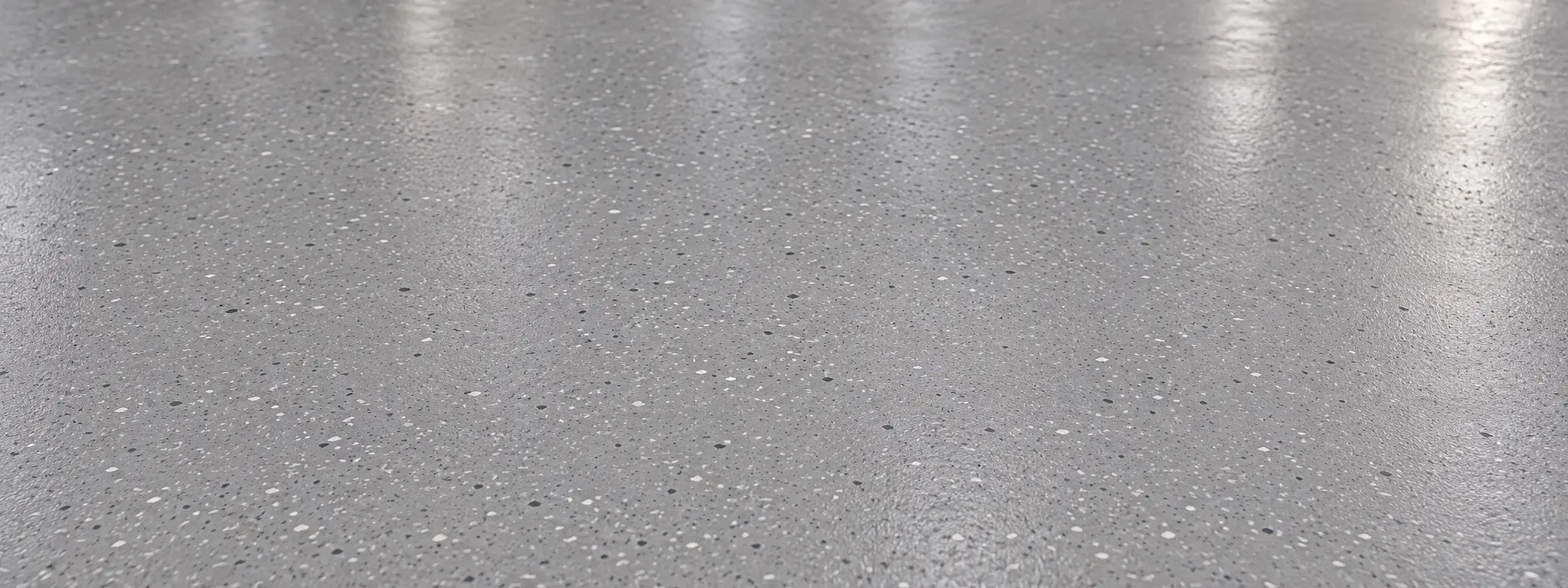Gray flooring with decorative flakes